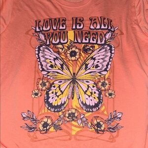 Peach Graphic Tee with Butterfly Design ‘Love is all you need’